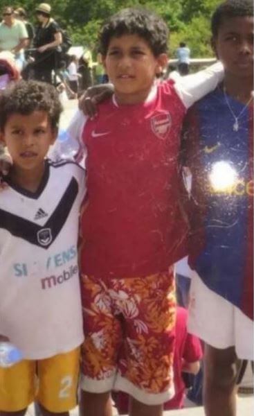 Young William Saliba in Arsenal jersey.